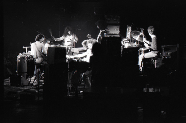 Santana concert at the Springfield Civic Center: view of Carlos Santana and band         from rear stage, February 27, 1973